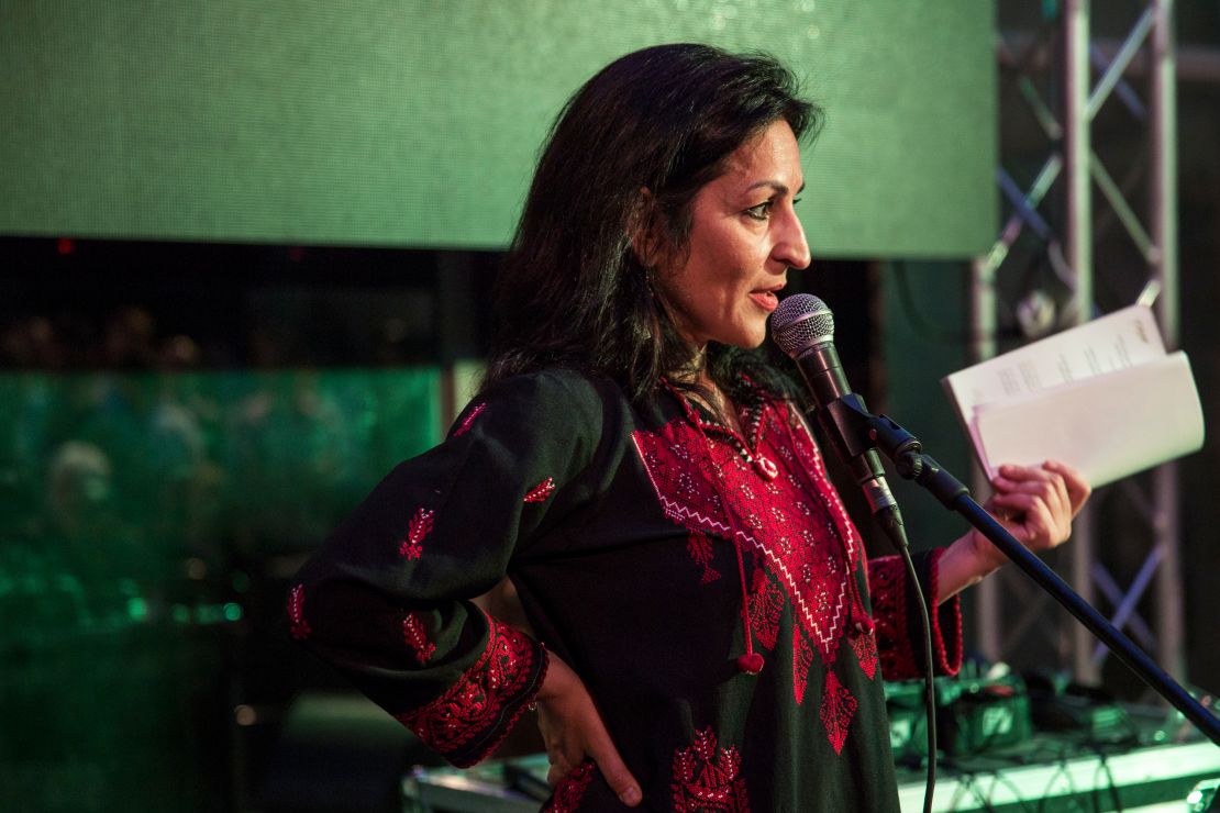 Susan Abulhawa, a Palestinian-American writer and human rights activist, speaks at a 2014 Palestine Festival of Literature event at Qasr al Qassem on June 4, 2014 in Beit Wazan, near Nablus, West Bank.